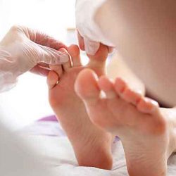 What is the treatment for thick toenails?